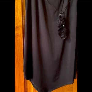 Handkerchief style black skirt with feather tie waist